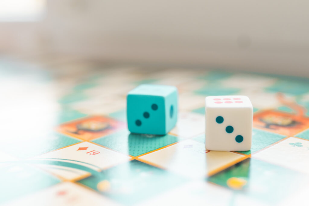 Board game with dice closeup. Play games concept.