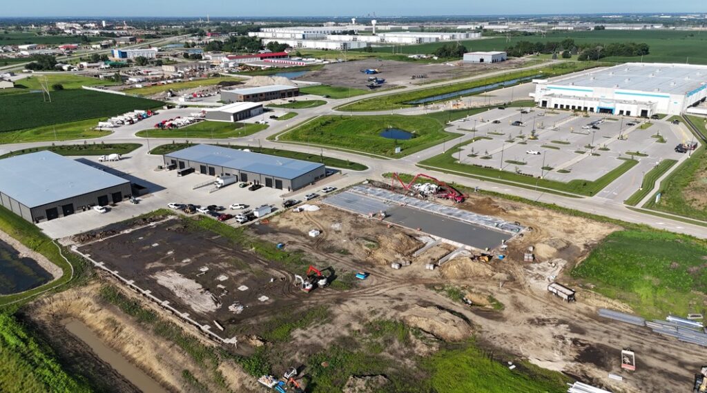 An aerial photo of construction work on two warehouse sites